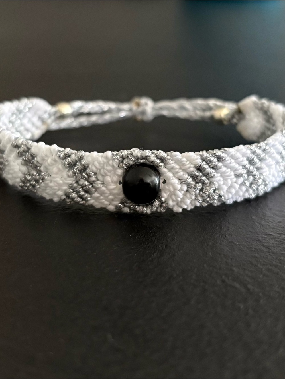 Handwoven White and Gray Friendship Bracelet with Black Bead